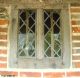 Click for photographs of window details.